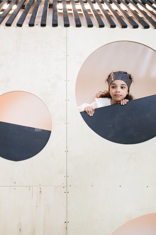 Free Young Girl Peeking on the Window  Stock Photo