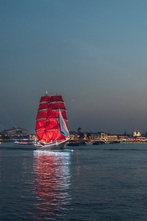 Mast on a Body of Water During Dusk