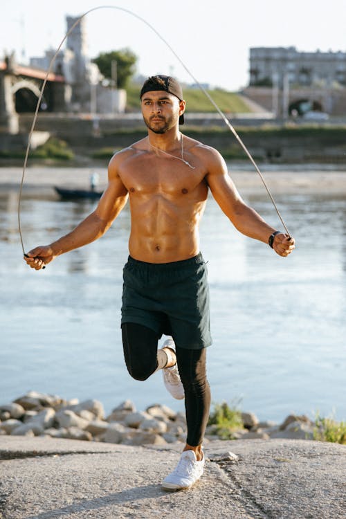 A Person wearing Cap using Jumping Rope
