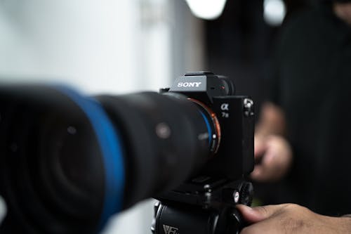 Free Close-up Photo of a Sony α7 III with Lens Stock Photo
