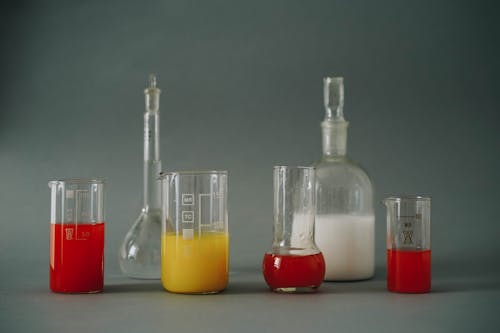 Photos gratuites de articles en verre, biochimie, bouteilles