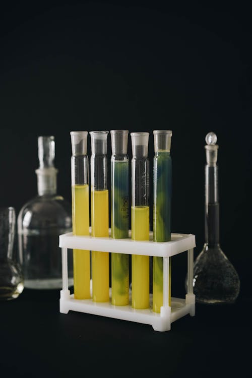 Free Close-Up Shot of Flasks and Test Tubes Stock Photo