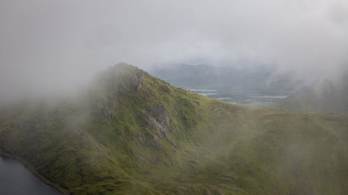 Green Mountain with Thick White Clouds