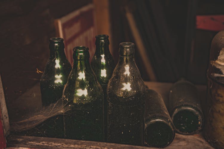 Close-Up Shot Of Vintage Alcohol Bottles