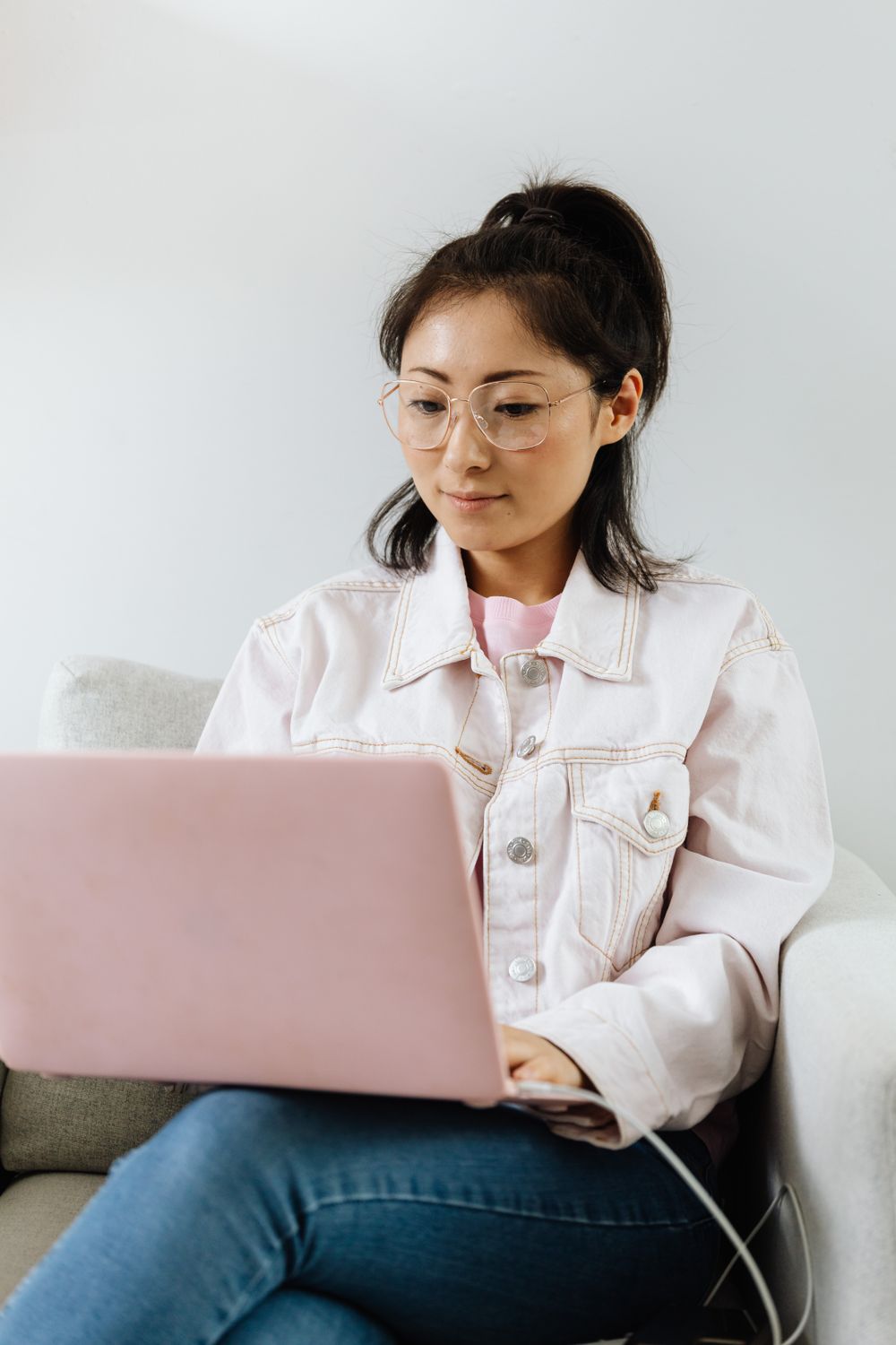 A Woman Working on Her Laptop · Free Stock Photo