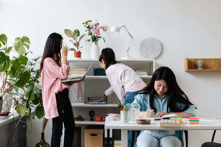 Photograph Of Women Working In An Office