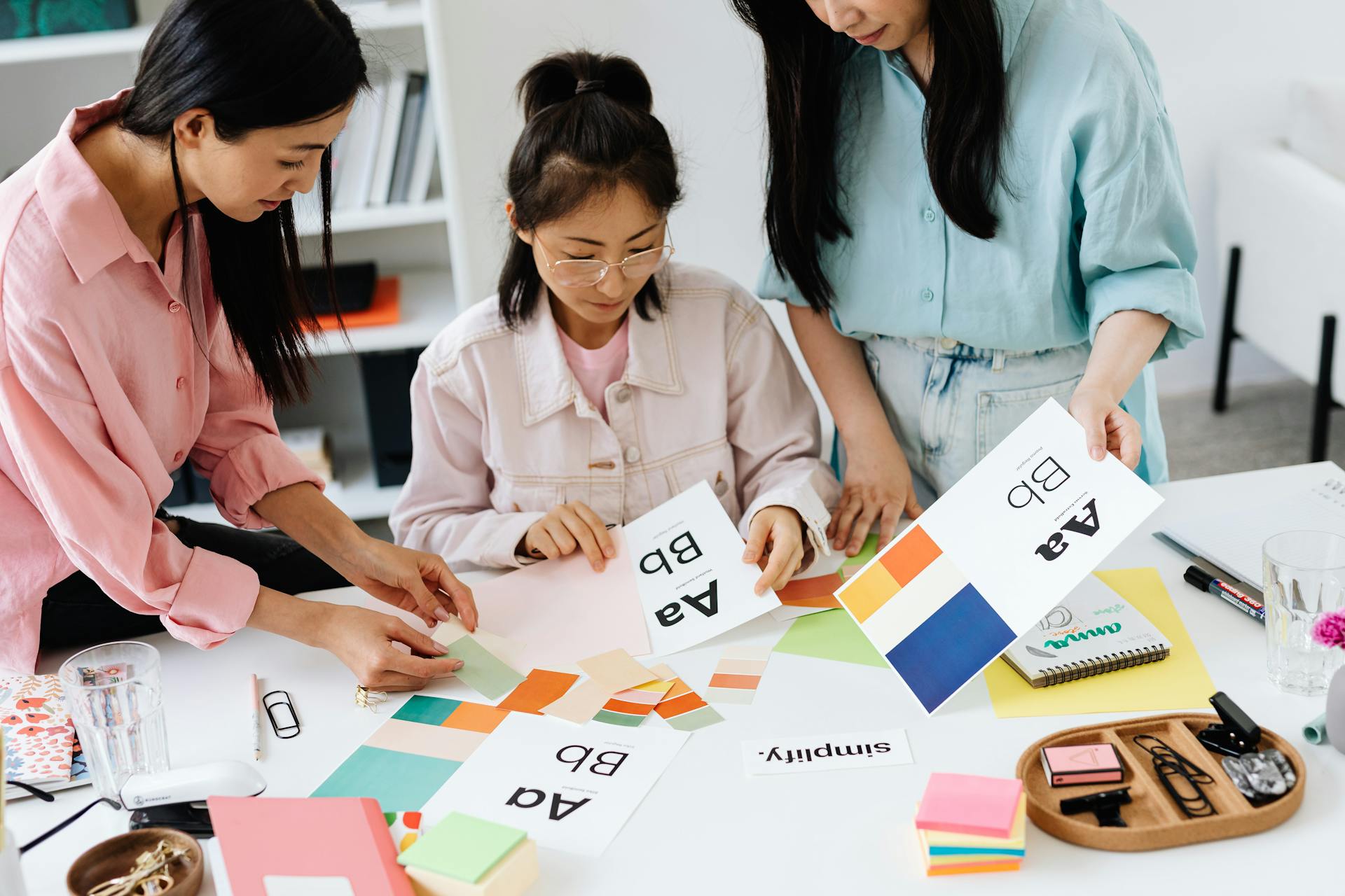 Women Looking at Color Samples