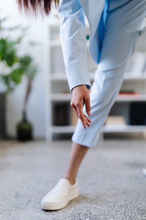 Woman Wearing Jeans and White Shoe 