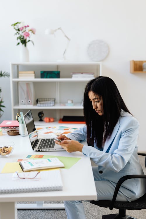 A Woman Working in Her Office