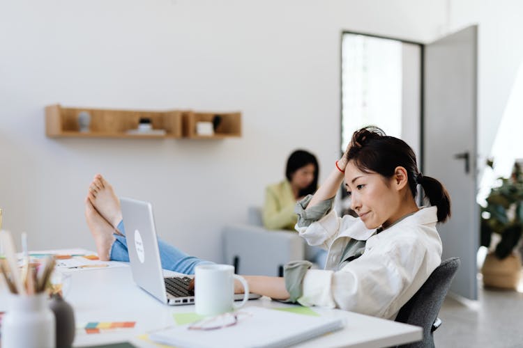 Stressed Woman Using A Laptop