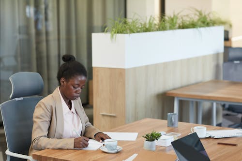 Free Woman Working at the Office Stock Photo