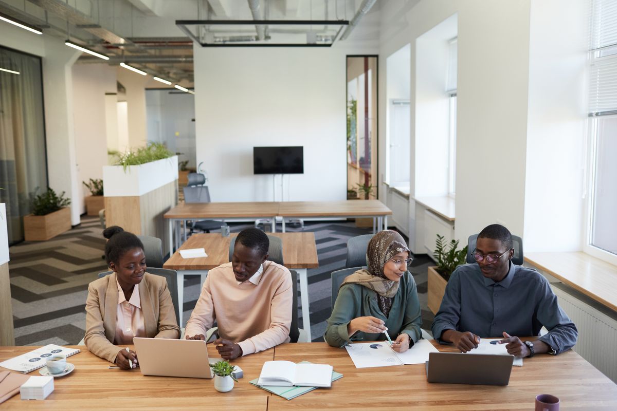 The Sparta Networking team collaborating in the office