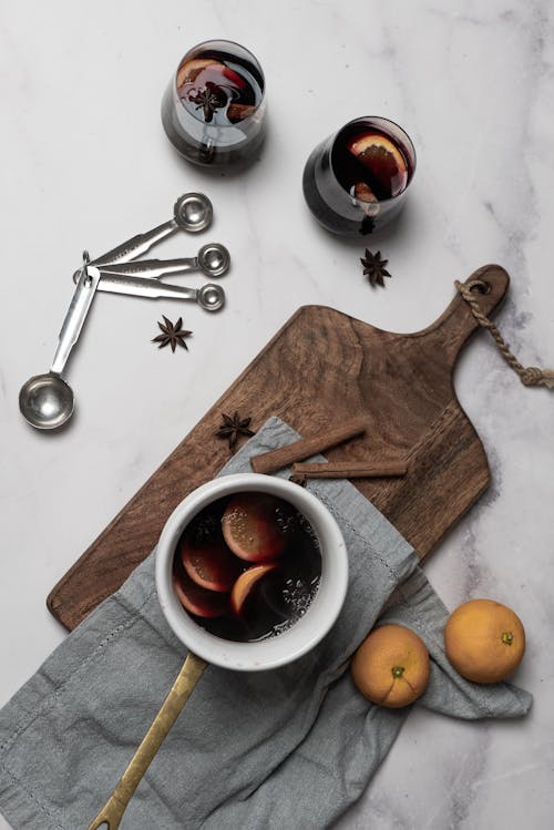 Mulled Wine Drinks Beside a Measuring Spoon