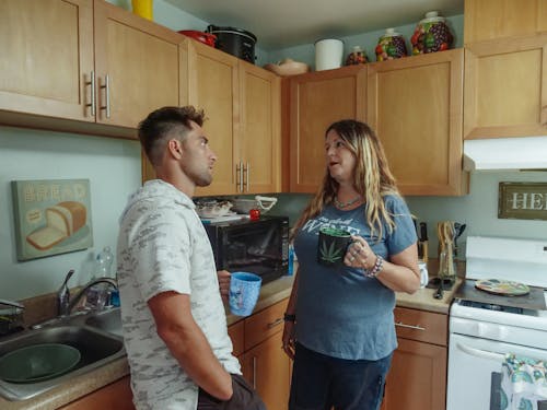 Mother and Son Having Coffee