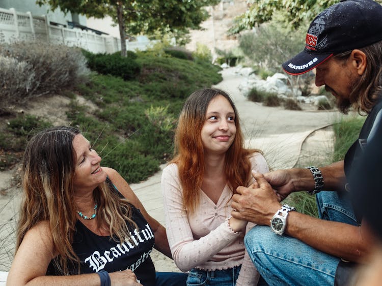 A Family Spending The Day In The Park