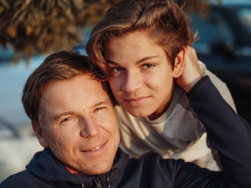 Portrait of Father and Teenage Son