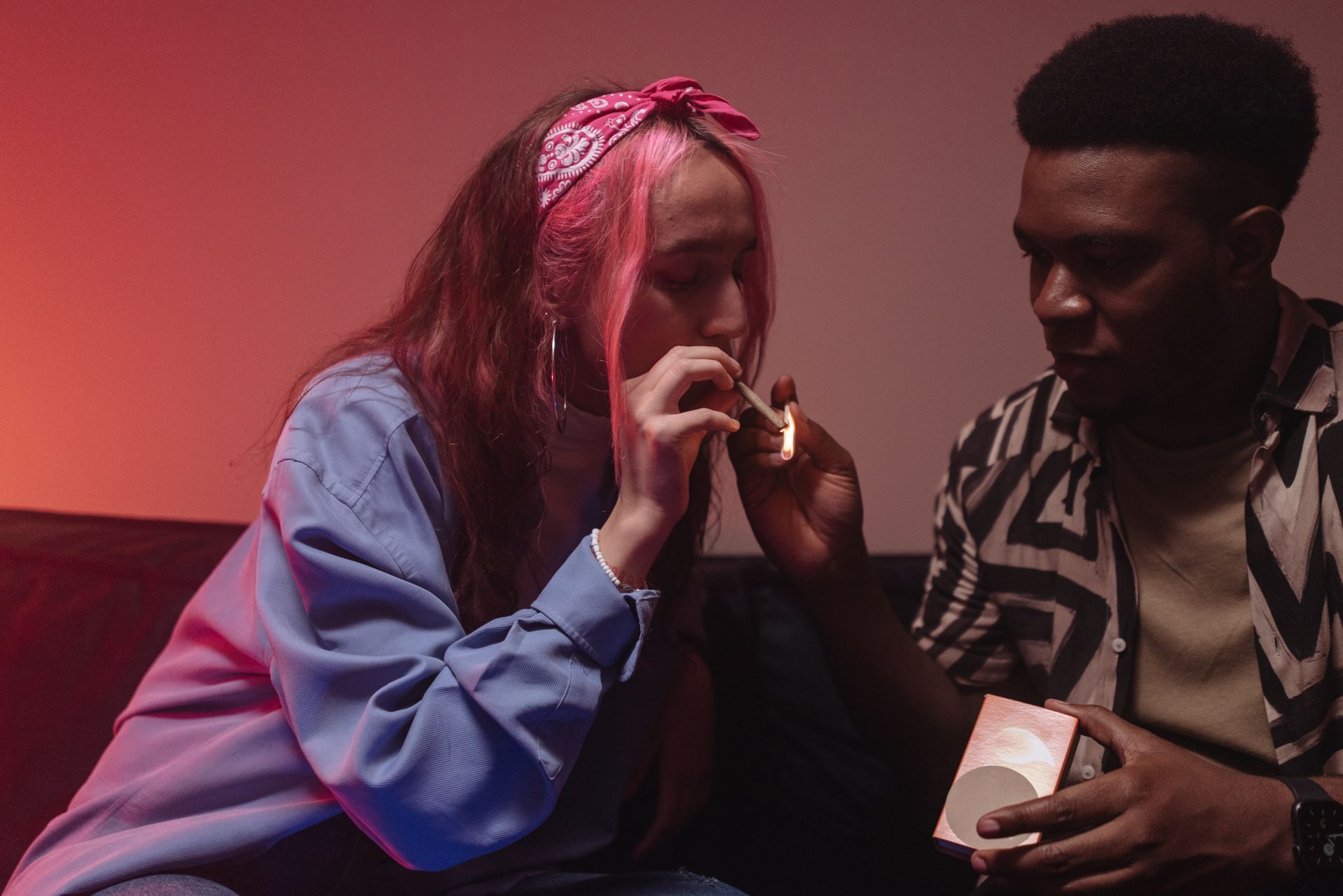 A Man Lighting a Joint