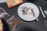 Close-up Photo of Marijuana and Paraphernalia
