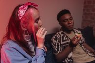 Close-up Photo of Woman smoking Pot