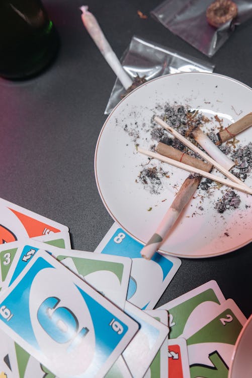 Burned Cigarette Butts in a Saucer