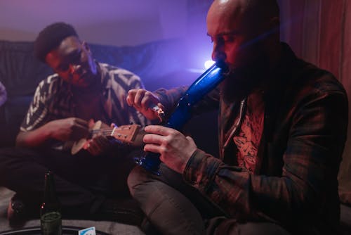 Free A Bearded Man Smoking with a Bong Stock Photo