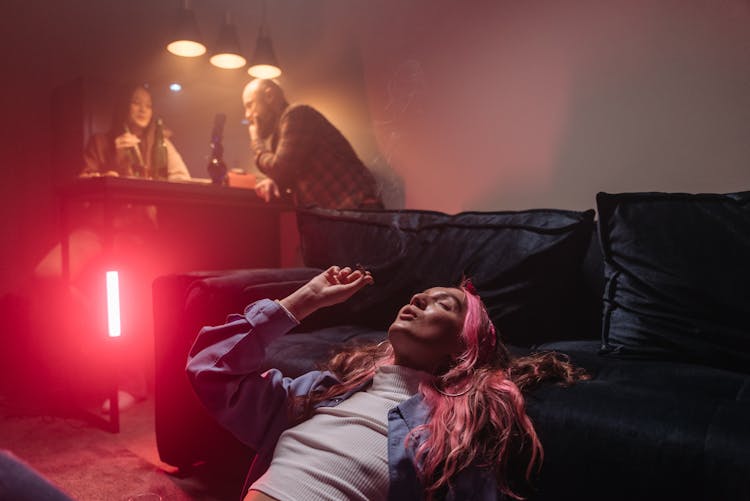 Woman Smoking Marijuana While Eyes Closed