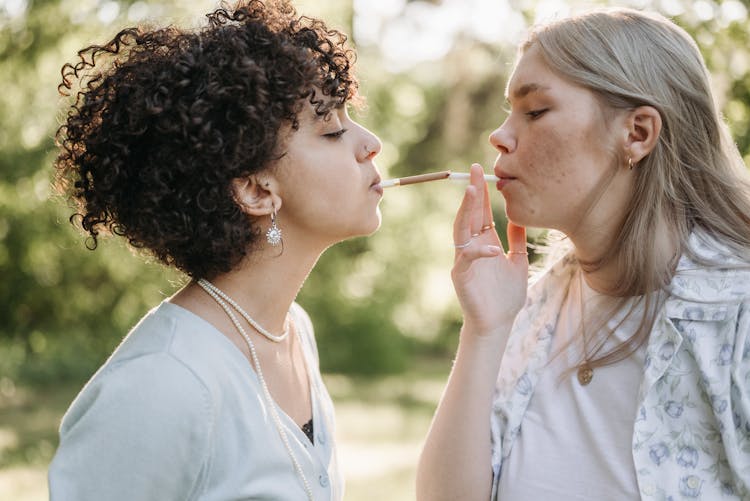 Women Smoking Cigarettes