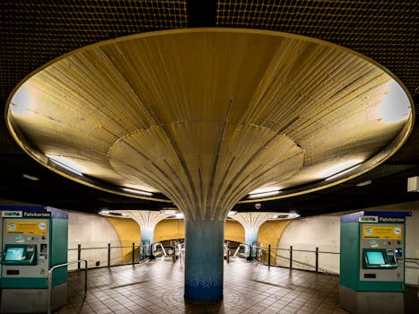 Unique architectural feature of an underground station in Germany, highlighted by vivid lighting.