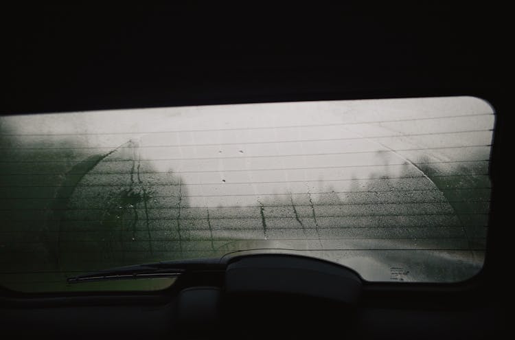 Wet Rear Windshield Of A Vehicle