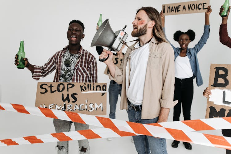 A Group Of People Protesting