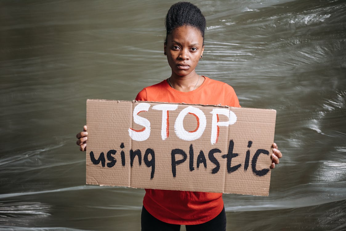 A Woman Holding a Placard