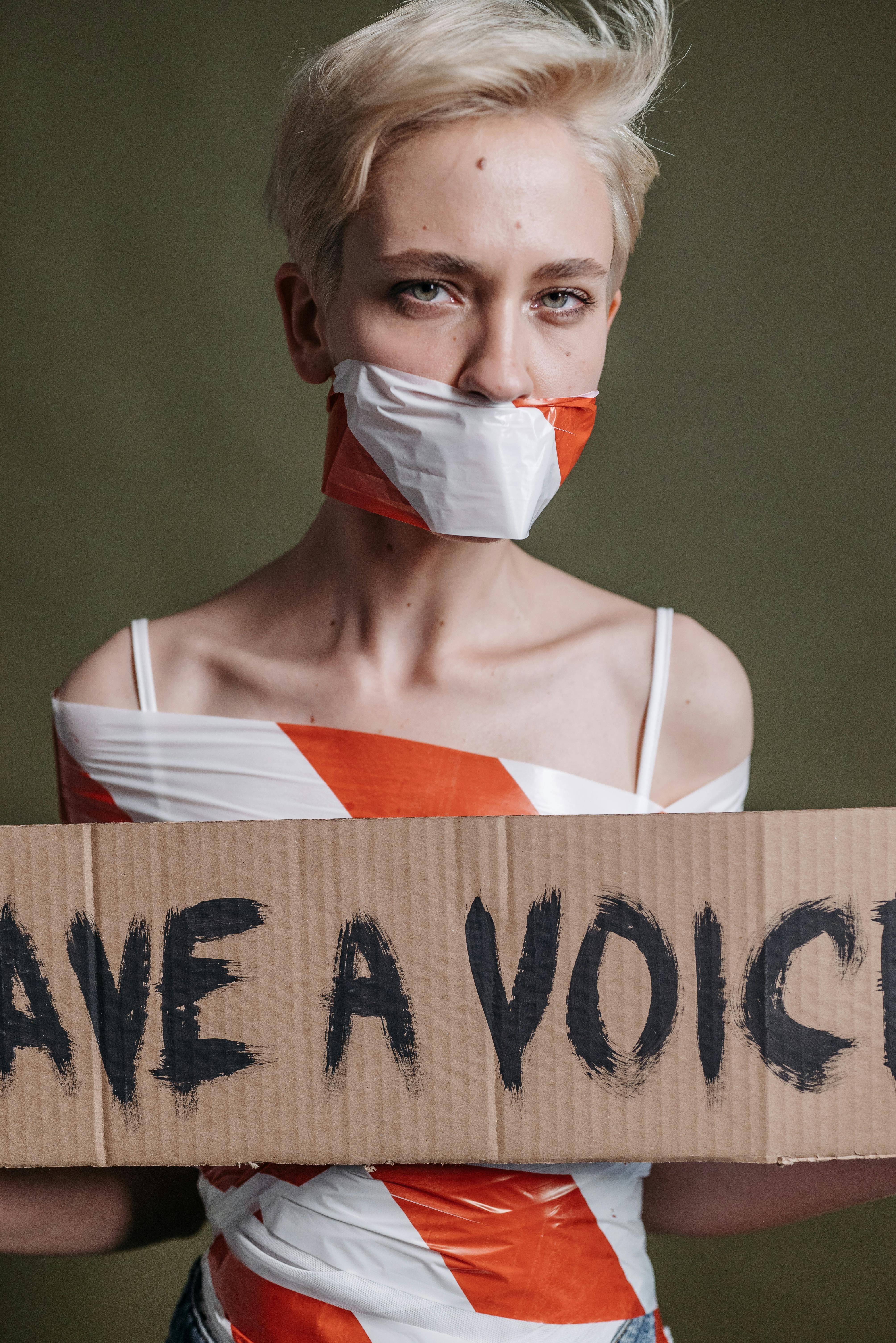 a woman holding a placard