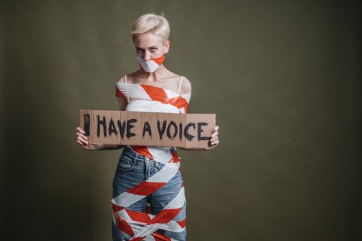 A Woman Holding a Placard
