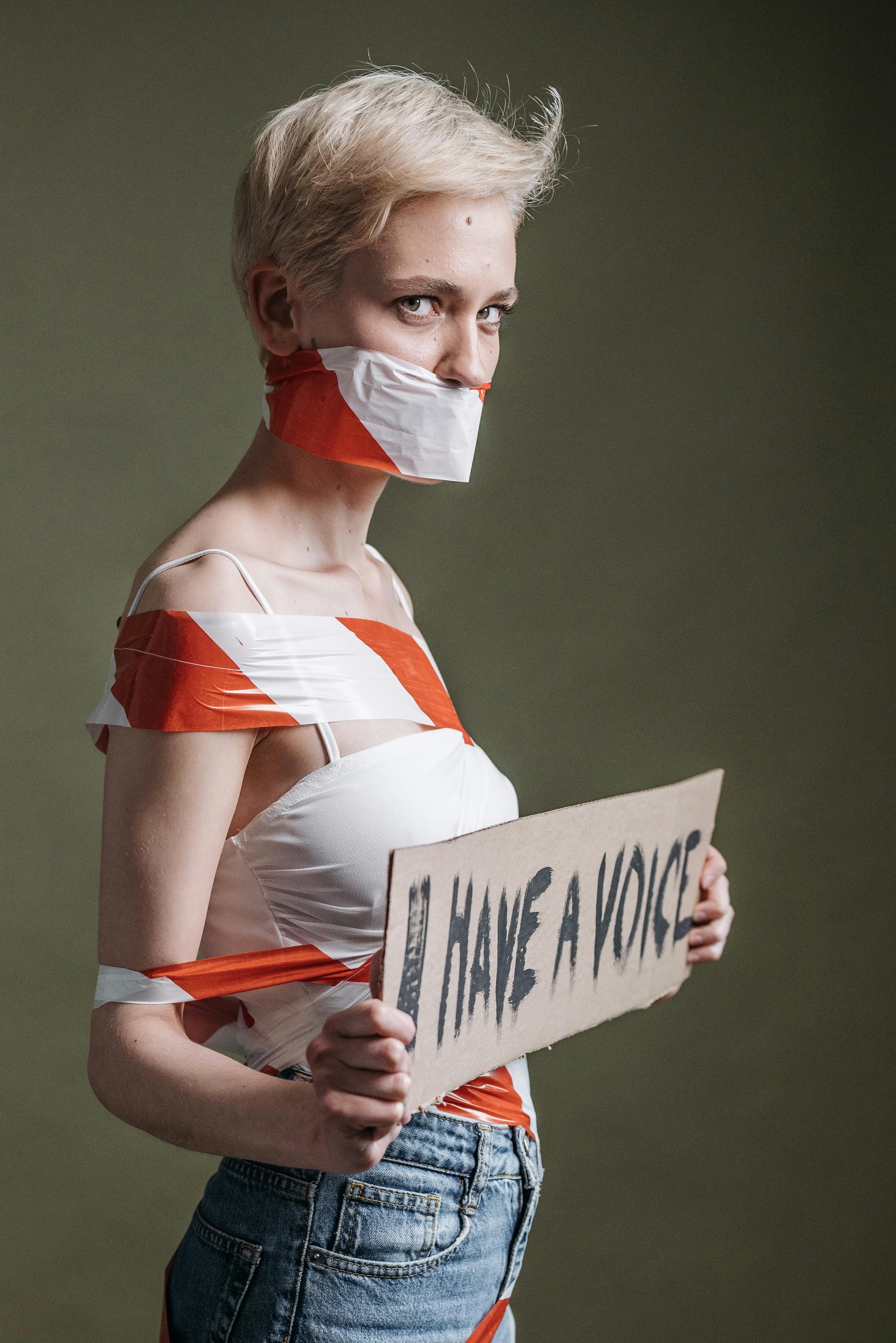 a woman holding a placard