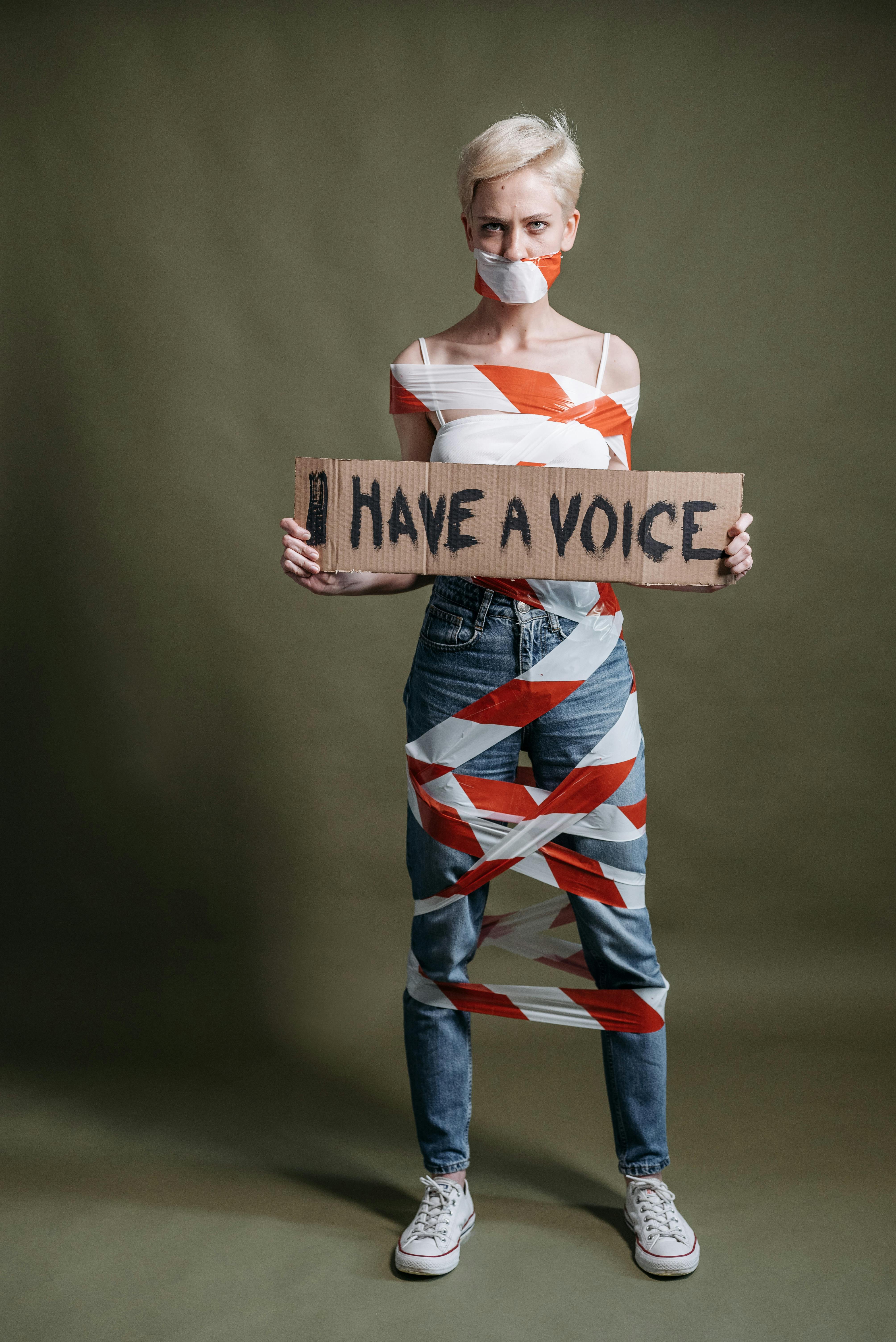 a woman holding a placard