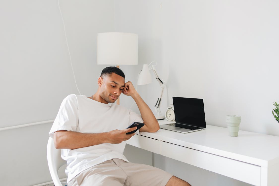 A Man Sitting at the Table · Free Stock Photo