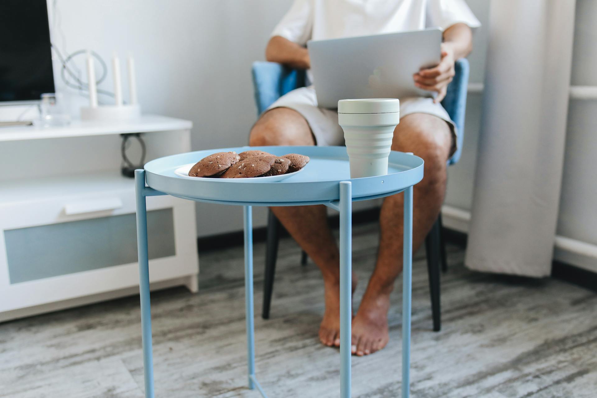 Cookies and Cup on Top of a Round Table