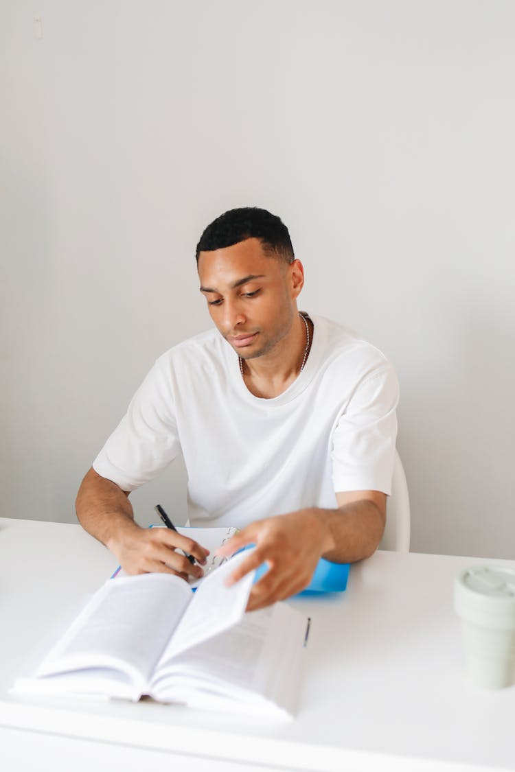 A Man Studying At Home