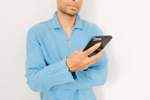 Free Close-up of an adult using smartphone, emphasizing mobile connectivity. Stock Photo