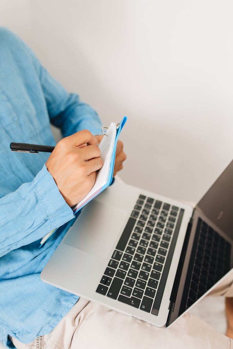 Person With Laptop On His Lap