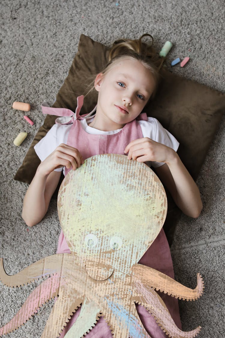 Girl Holding An Octopus Cutout