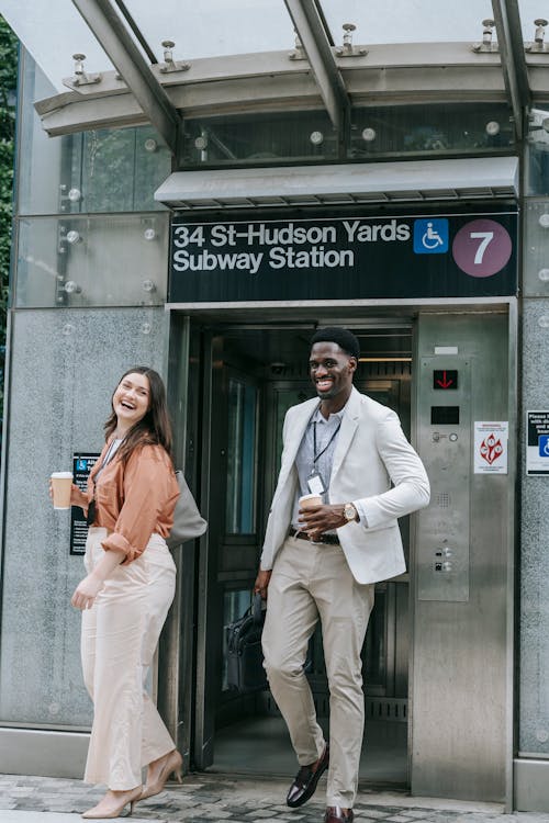 Two People at a Subway Station Entrance