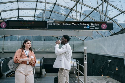 Two People at a Subway Station