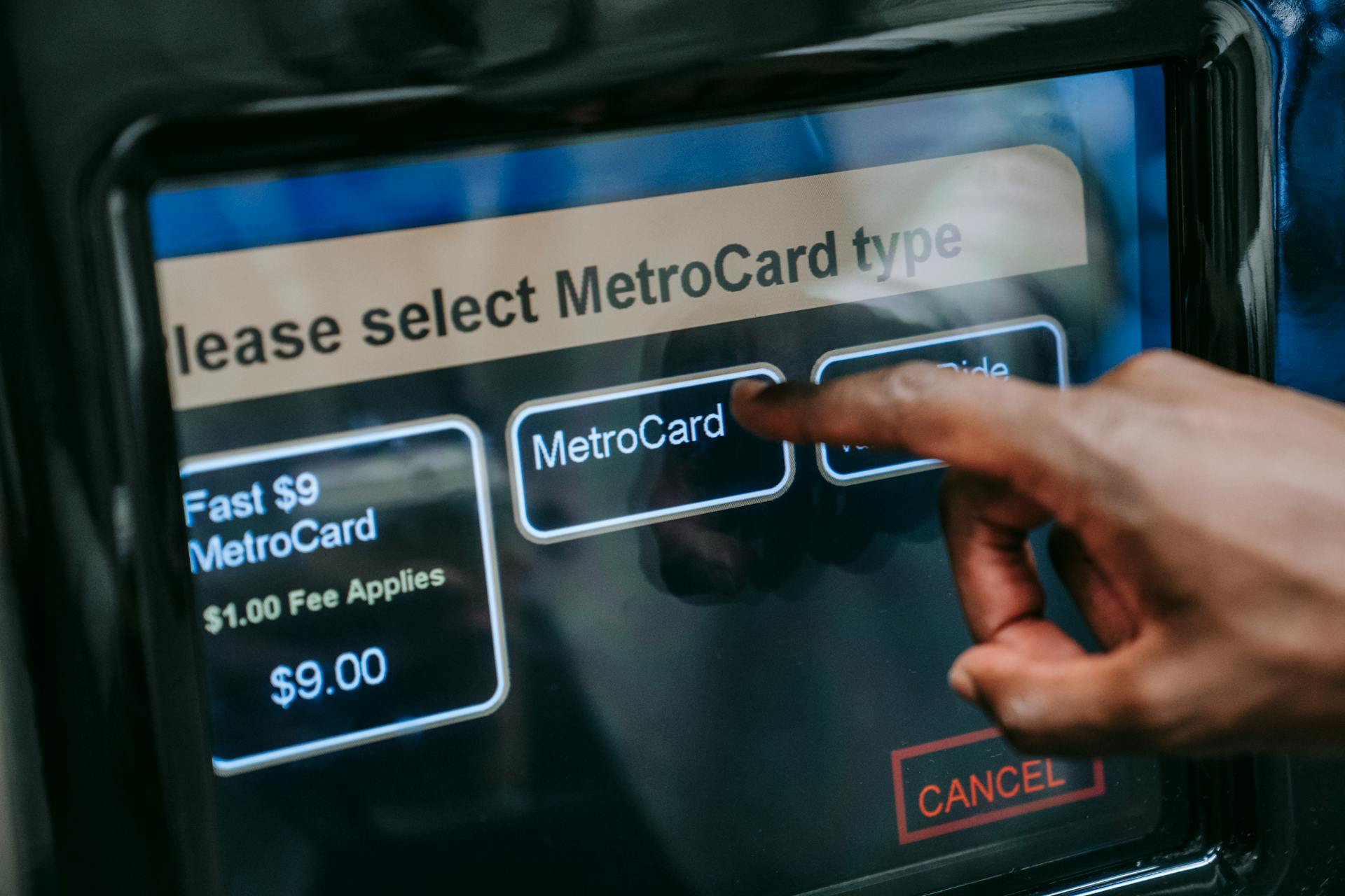 Close-up of Man Buying a Ticket in a Ticket Machine