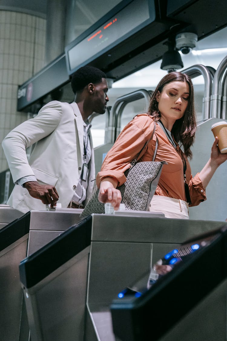 Man And Woman At A Subway Station Terminal 