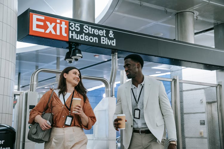 Woman And Man Leaving New York Metro