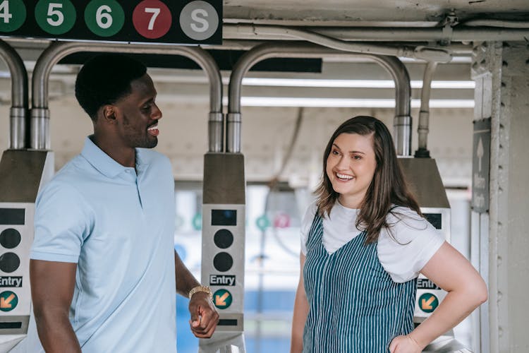 Man And Woman At Subway Station Gates