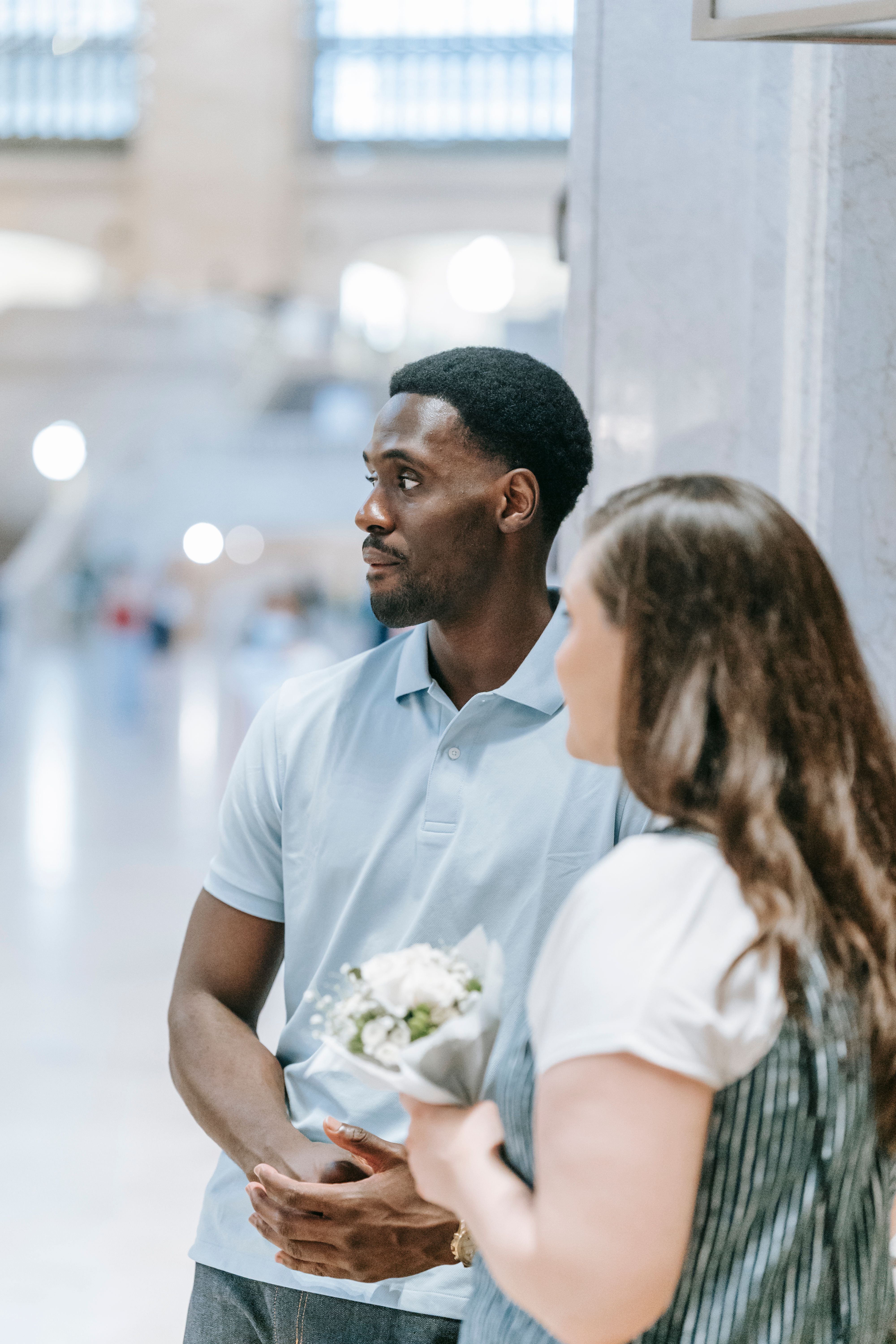 Man in Blue Polo Shirt Standing Beside a Woman · Free Stock Photo