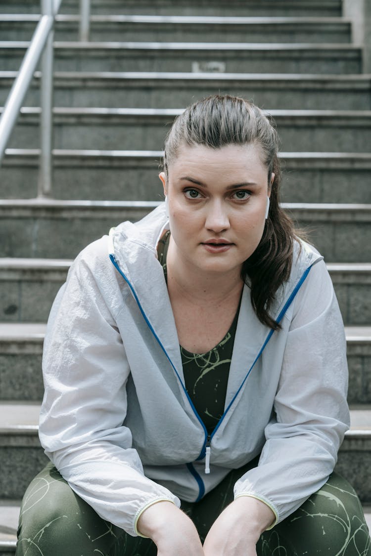 Woman Wearing A White Jacket