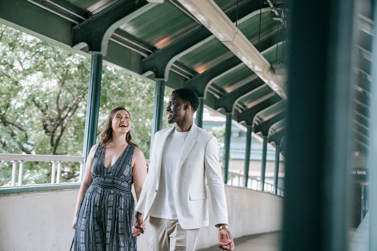 Couple walking together and holding hands
